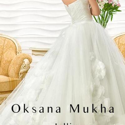 Весільна сукня "Jolli" від Оксани Мухи — логотип