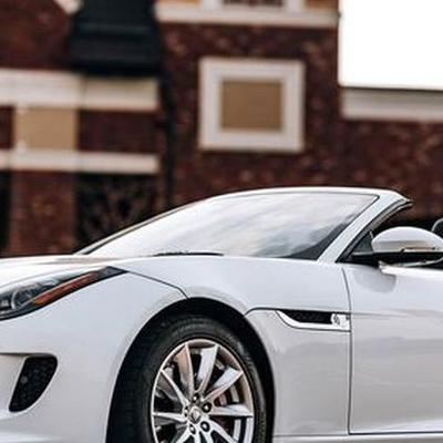 441 Прокат Jaguar F-Type кабріолет білий — логотип