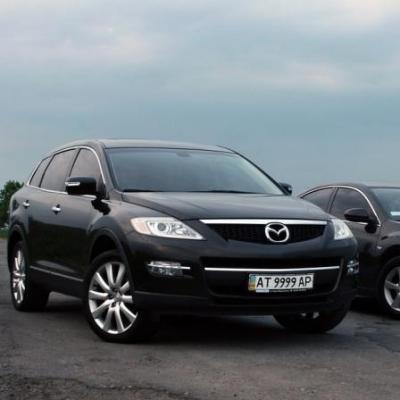 Кортеж-Захід. Mazda, Mitsubishi — логотип