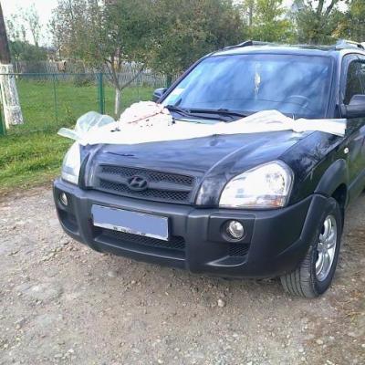 Хюндай Тусон на весілля — логотип