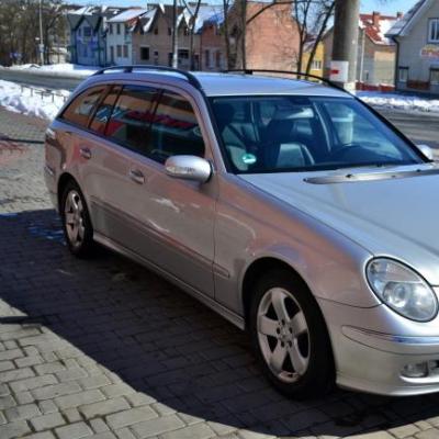 Тарас (Mercedes w211 і BMW X5) — логотип