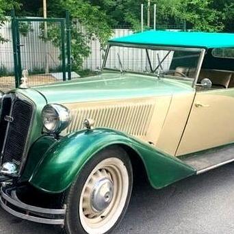 196Кабріолет ретро Dampf Kraft Wagen (DK — логотип