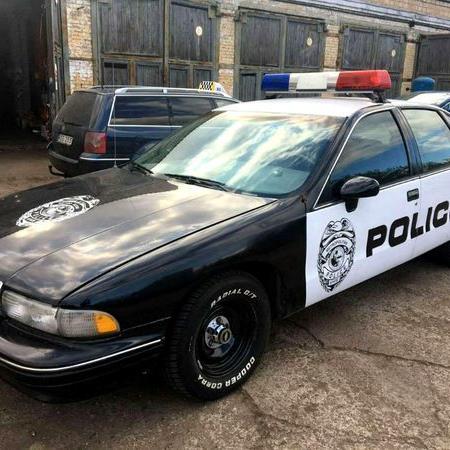 382Автомобіль поліції Chevrolet Caprice — логотип