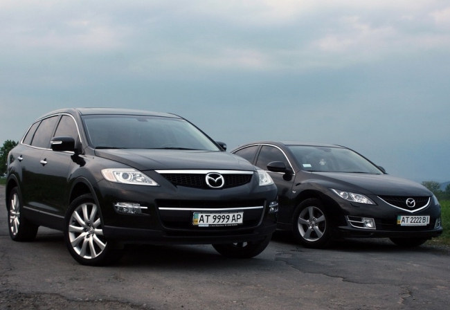 Кортеж-Захід. Mazda, Mitsubishi — логотип
