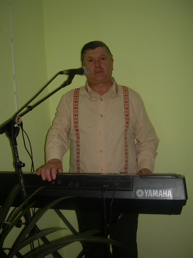 Роман Минай — логотип